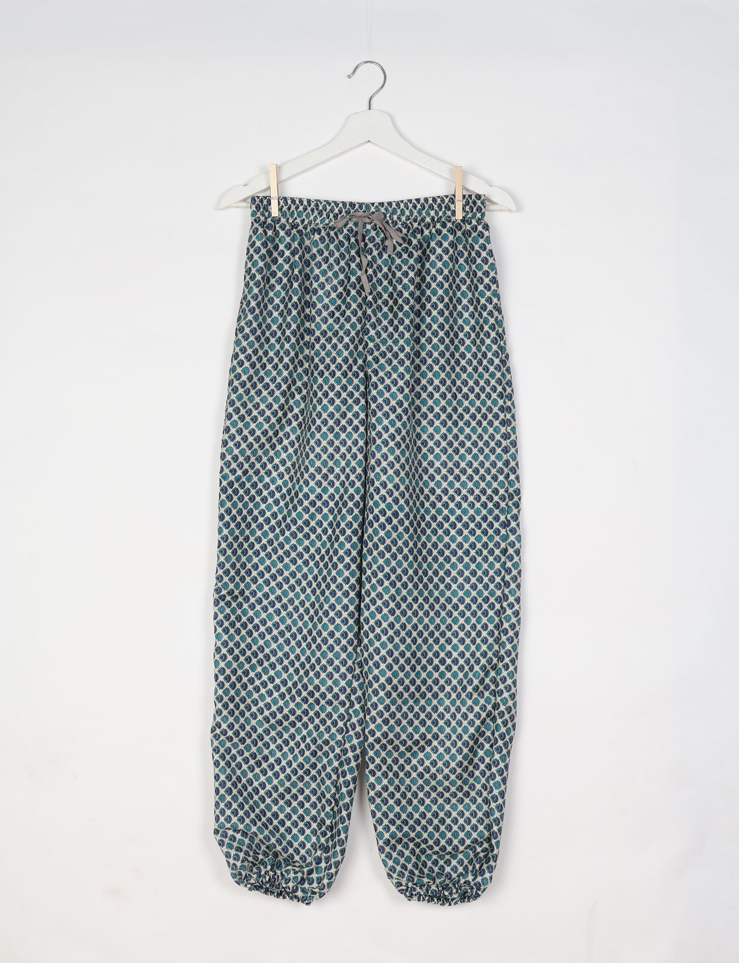 Comfortable and sustainable JOGGER PANTS, pull-on style crafted from eco-materials. Elastic drawstring waist, cotton twill tape, elasticated hems, and slant pockets for style and functionality. Make a positive impact on people and the planet with your fashion choices.