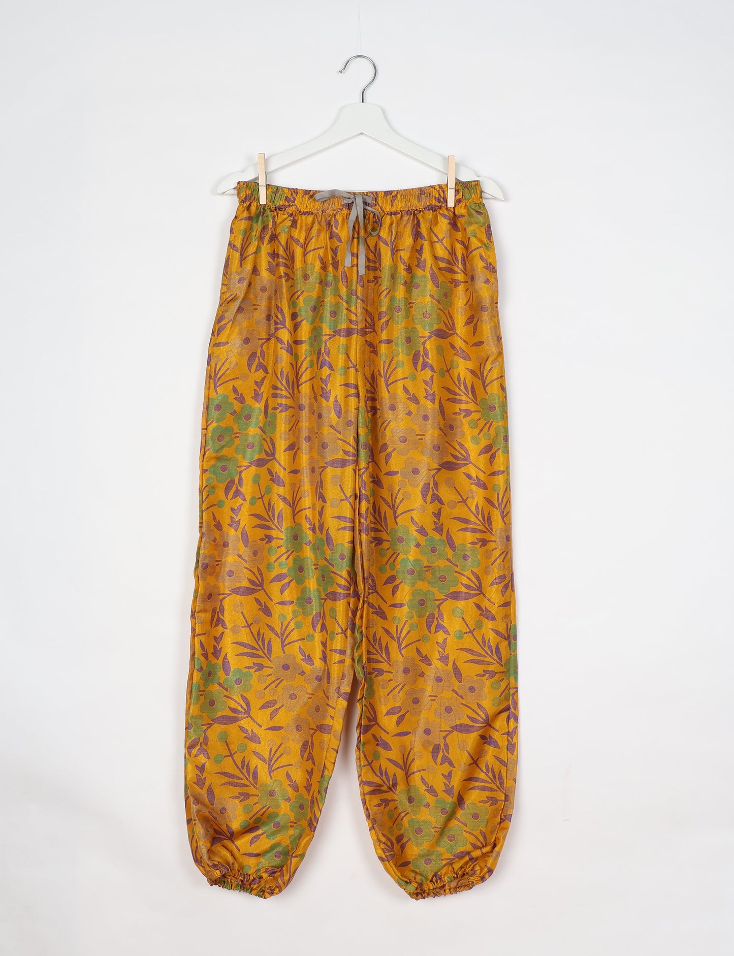 Comfortable and sustainable JOGGER PANTS, pull-on style crafted from eco-materials. Elastic drawstring waist, cotton twill tape, elasticated hems, and slant pockets for style and functionality. Make a positive impact on people and the planet with your fashion choices.