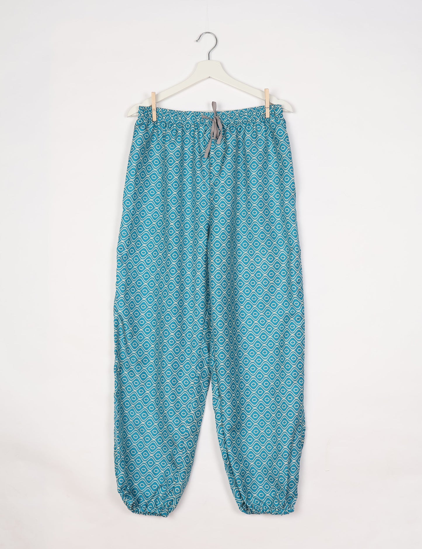 Comfortable and sustainable JOGGER PANTS, pull-on style crafted from eco-materials. Elastic drawstring waist, cotton twill tape, elasticated hems, and slant pockets for style and functionality. Make a positive impact on people and the planet with your fashion choices.