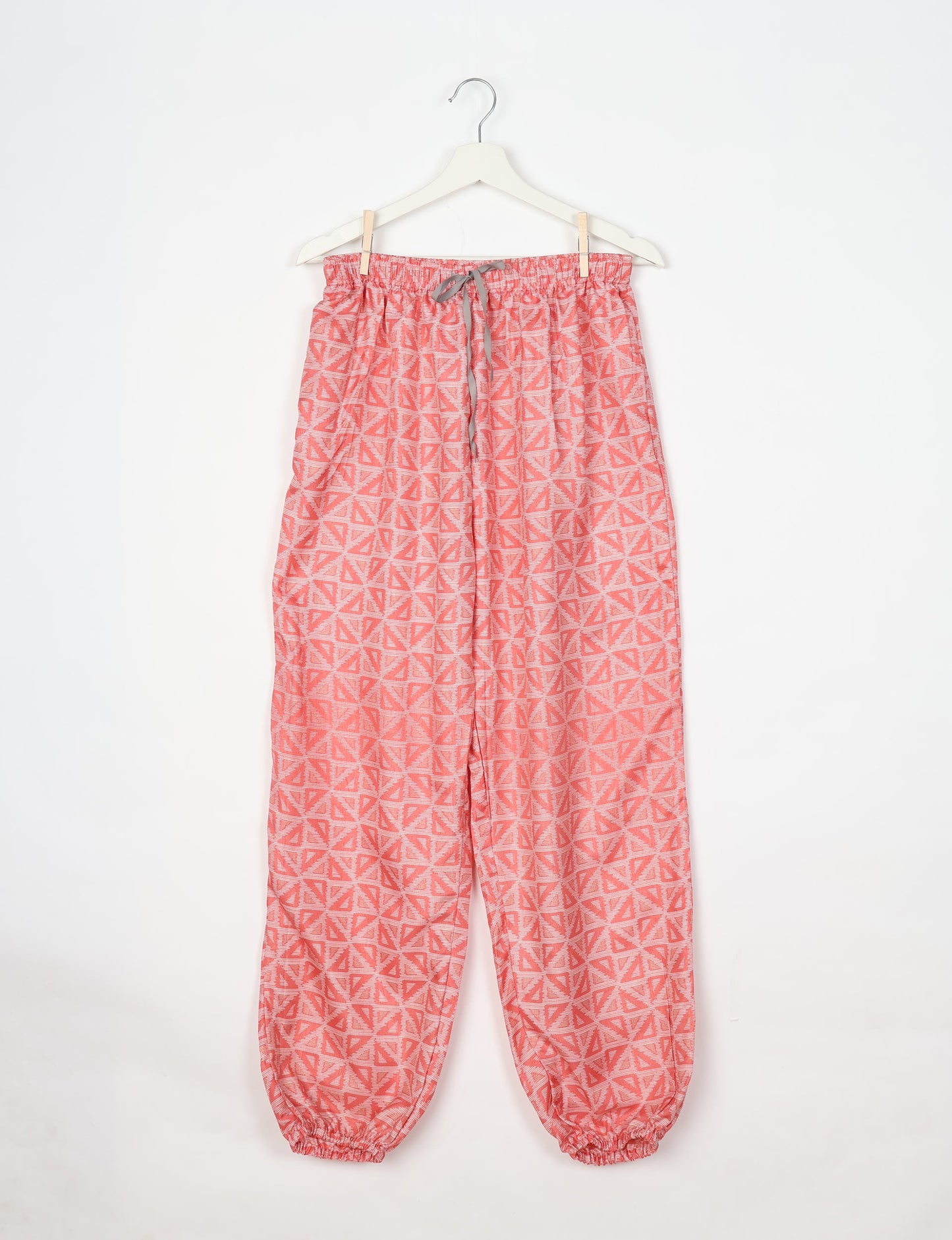 Comfortable and sustainable JOGGER PANTS, pull-on style crafted from eco-materials. Elastic drawstring waist, cotton twill tape, elasticated hems, and slant pockets for style and functionality. Make a positive impact on people and the planet with your fashion choices.