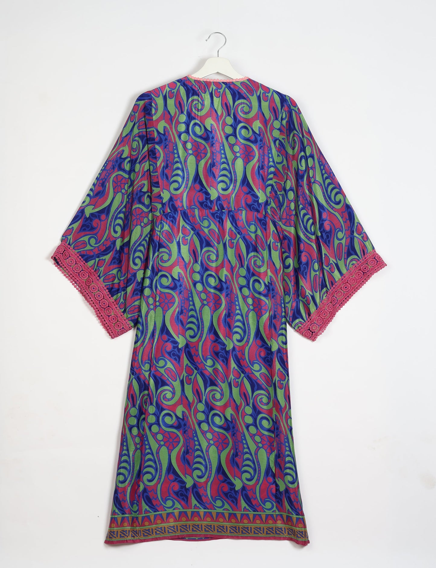 Maxi Kaftan with cotton lace on sleeves and midriff, featuring a tie-up neckline with tassels. Ankle-length, eco-friendly fashion made from recycled materials, offering sustainable women’s clothing for a chic, earth-friendly wardrobe.