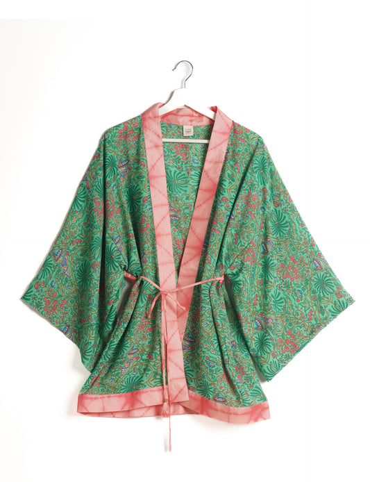 Chic and versatile KIMONO ROBE PRINT with a belt and loose straight-line sleeves. Throw it over swimwear, a t-shirt and shorts, leggings, or jeans for an instant style upgrade. Embrace fashionable versatility with this statement piece.