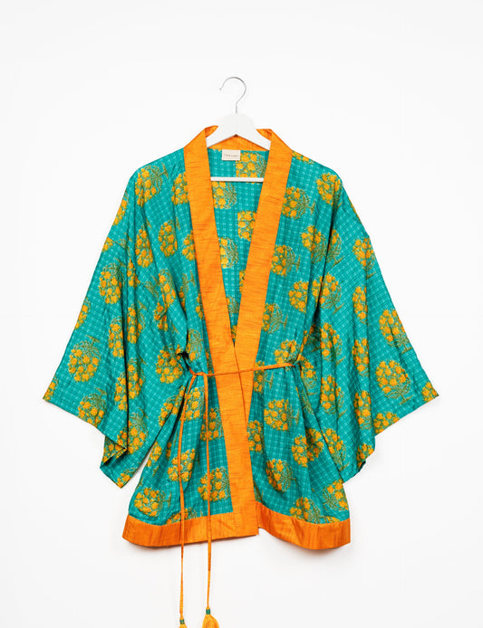 Chic and versatile KIMONO ROBE PRINT with a belt and loose straight-line sleeves. Throw it over swimwear, a t-shirt and shorts, leggings, or jeans for an instant style upgrade. Embrace fashionable versatility with this statement piece.