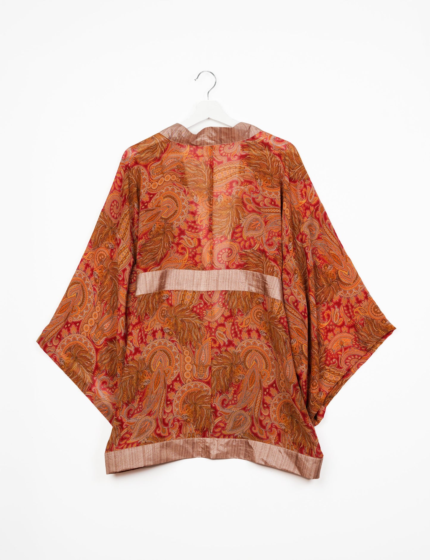 Chic and versatile KIMONO ROBE PRINT with a belt and loose straight-line sleeves. Throw it over swimwear, a t-shirt and shorts, leggings, or jeans for an instant style upgrade. Embrace fashionable versatility with this statement piece.