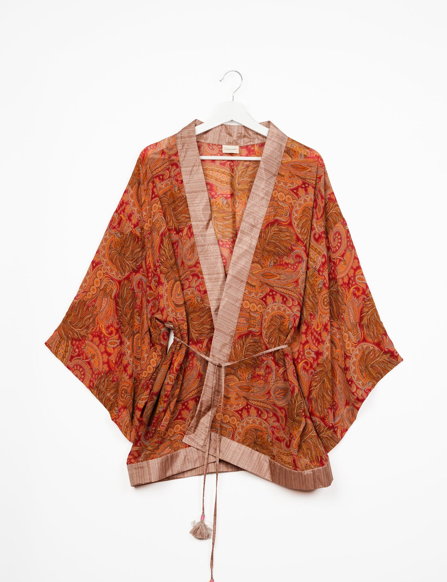 Chic and versatile KIMONO ROBE PRINT with a belt and loose straight-line sleeves. Throw it over swimwear, a t-shirt and shorts, leggings, or jeans for an instant style upgrade. Embrace fashionable versatility with this statement piece.