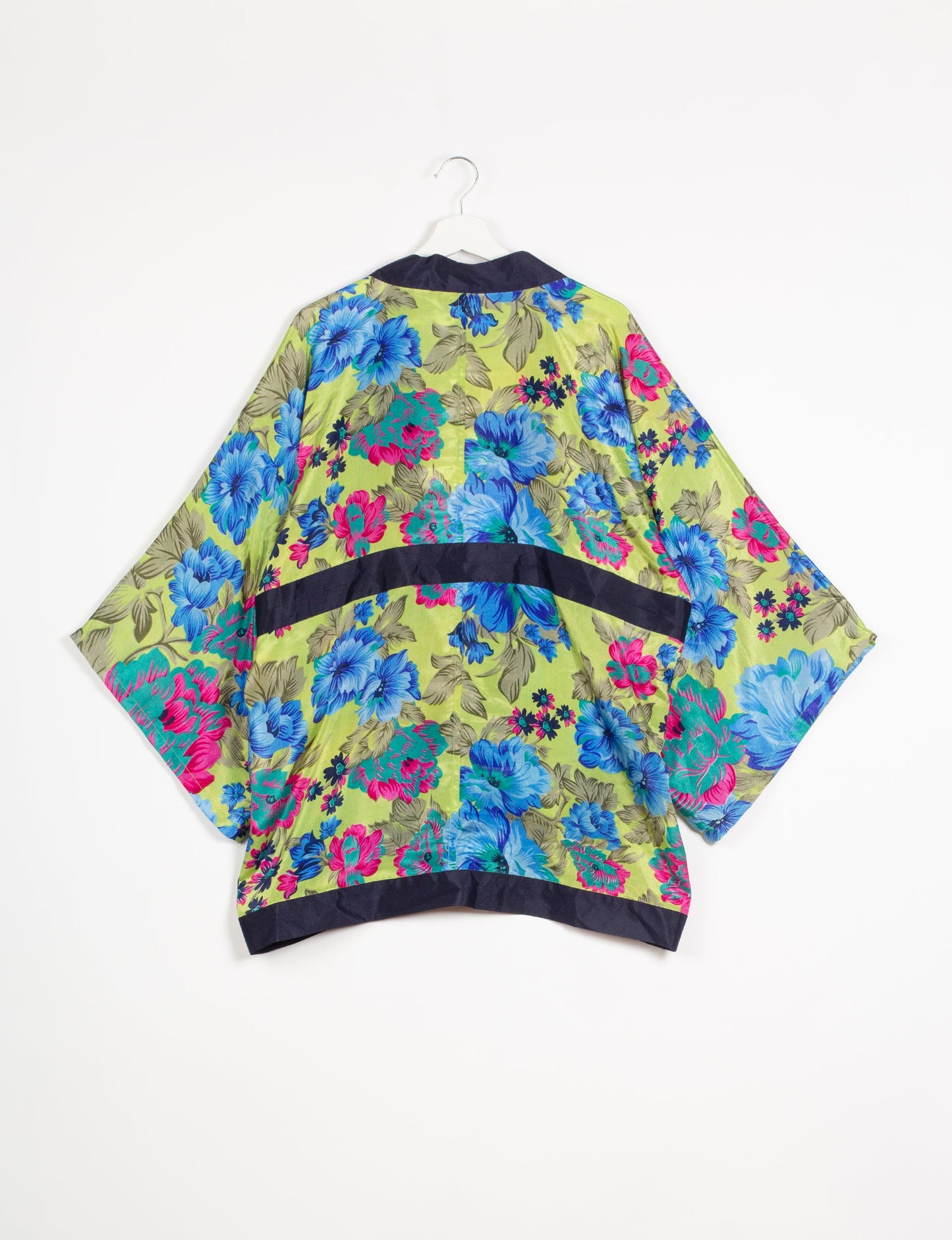 Chic and versatile KIMONO ROBE PRINT with a belt and loose straight-line sleeves. Throw it over swimwear, a t-shirt and shorts, leggings, or jeans for an instant style upgrade. Embrace fashionable versatility with this statement piece.