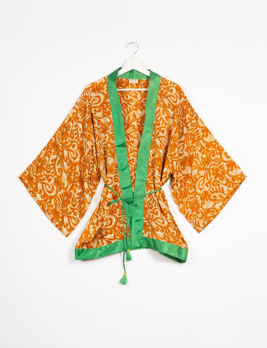 Chic and versatile KIMONO ROBE PRINT with a belt and loose straight-line sleeves. Throw it over swimwear, a t-shirt and shorts, leggings, or jeans for an instant style upgrade. Embrace fashionable versatility with this statement piece.