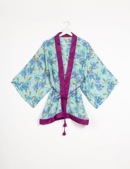 Chic and versatile KIMONO ROBE PRINT with a belt and loose straight-line sleeves. Throw it over swimwear, a t-shirt and shorts, leggings, or jeans for an instant style upgrade. Embrace fashionable versatility with this statement piece.