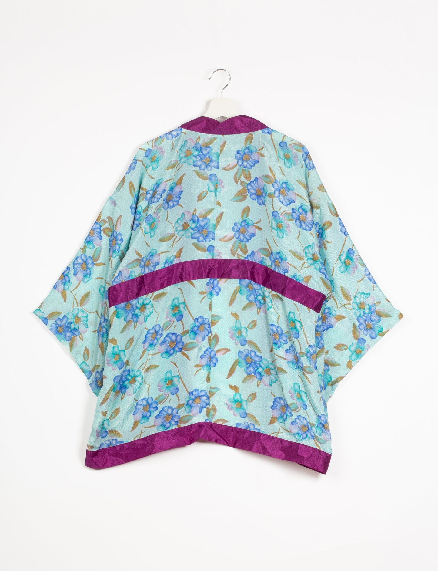 Chic and versatile KIMONO ROBE PRINT with a belt and loose straight-line sleeves. Throw it over swimwear, a t-shirt and shorts, leggings, or jeans for an instant style upgrade. Embrace fashionable versatility with this statement piece.