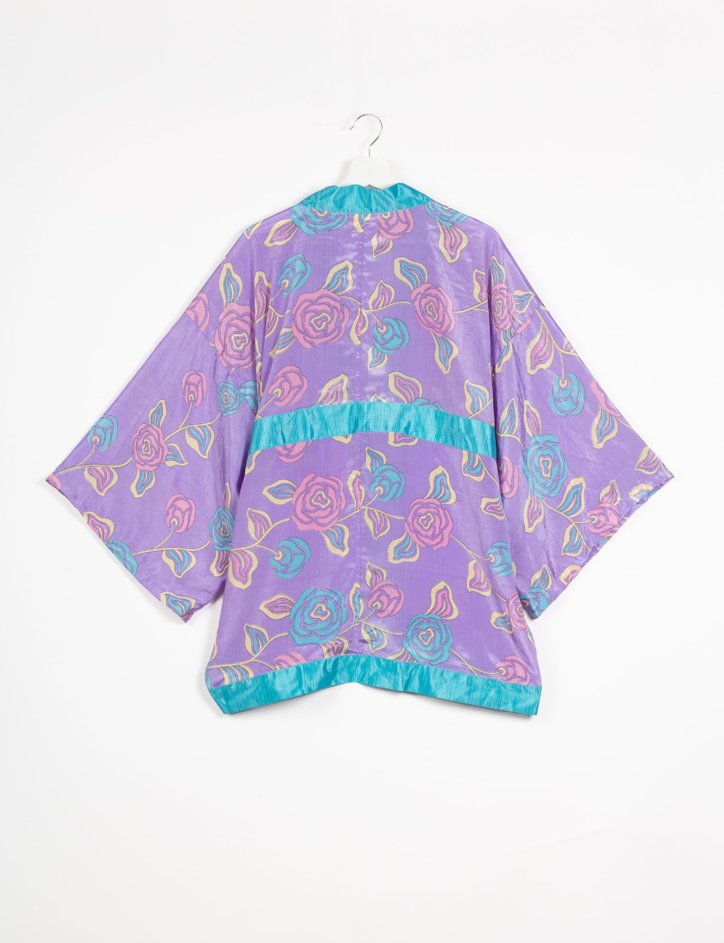 Chic and versatile KIMONO ROBE PRINT with a belt and loose straight-line sleeves. Throw it over swimwear, a t-shirt and shorts, leggings, or jeans for an instant style upgrade. Embrace fashionable versatility with this statement piece.