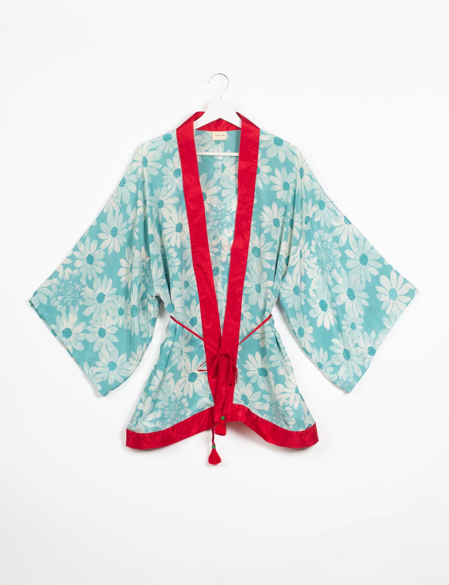 Chic and versatile KIMONO ROBE PRINT with a belt and loose straight-line sleeves. Throw it over swimwear, a t-shirt and shorts, leggings, or jeans for an instant style upgrade. Embrace fashionable versatility with this statement piece.