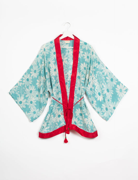 Chic and versatile KIMONO ROBE PRINT with a belt and loose straight-line sleeves. Throw it over swimwear, a t-shirt and shorts, leggings, or jeans for an instant style upgrade. Embrace fashionable versatility with this statement piece.