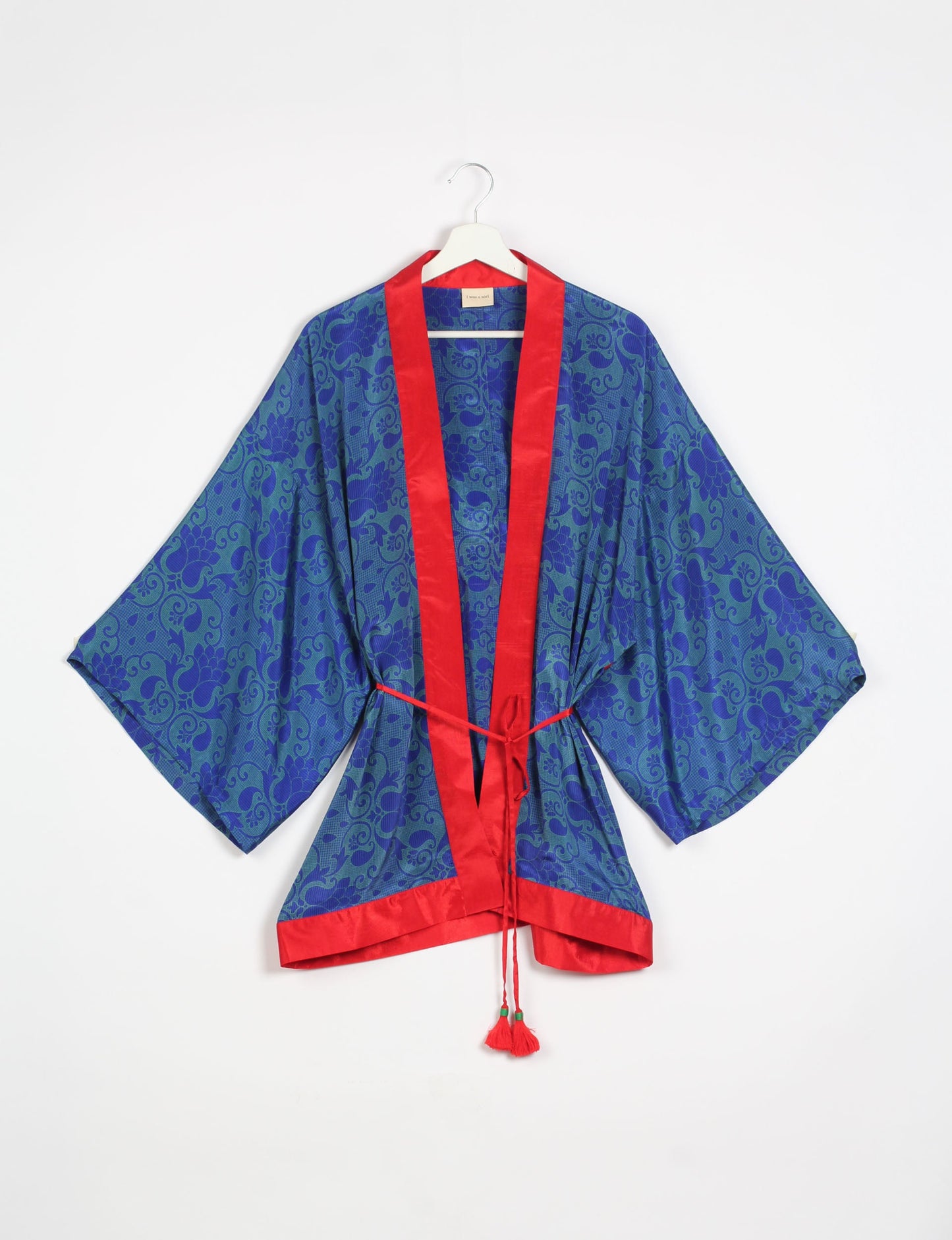 Chic and versatile KIMONO ROBE PRINT with a belt and loose straight-line sleeves. Throw it over swimwear, a t-shirt and shorts, leggings, or jeans for an instant style upgrade. Embrace fashionable versatility with this statement piece.