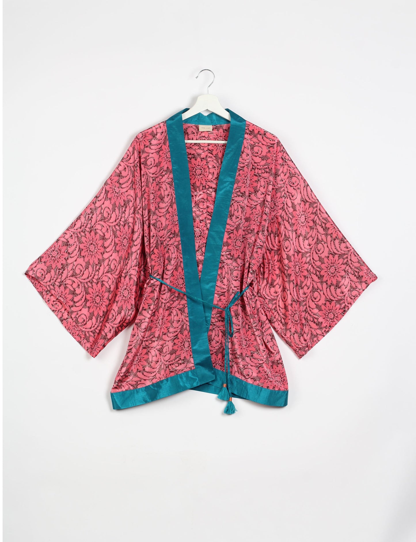 Chic and versatile KIMONO ROBE PRINT with a belt and loose straight-line sleeves. Throw it over swimwear, a t-shirt and shorts, leggings, or jeans for an instant style upgrade. Embrace fashionable versatility with this statement piece.