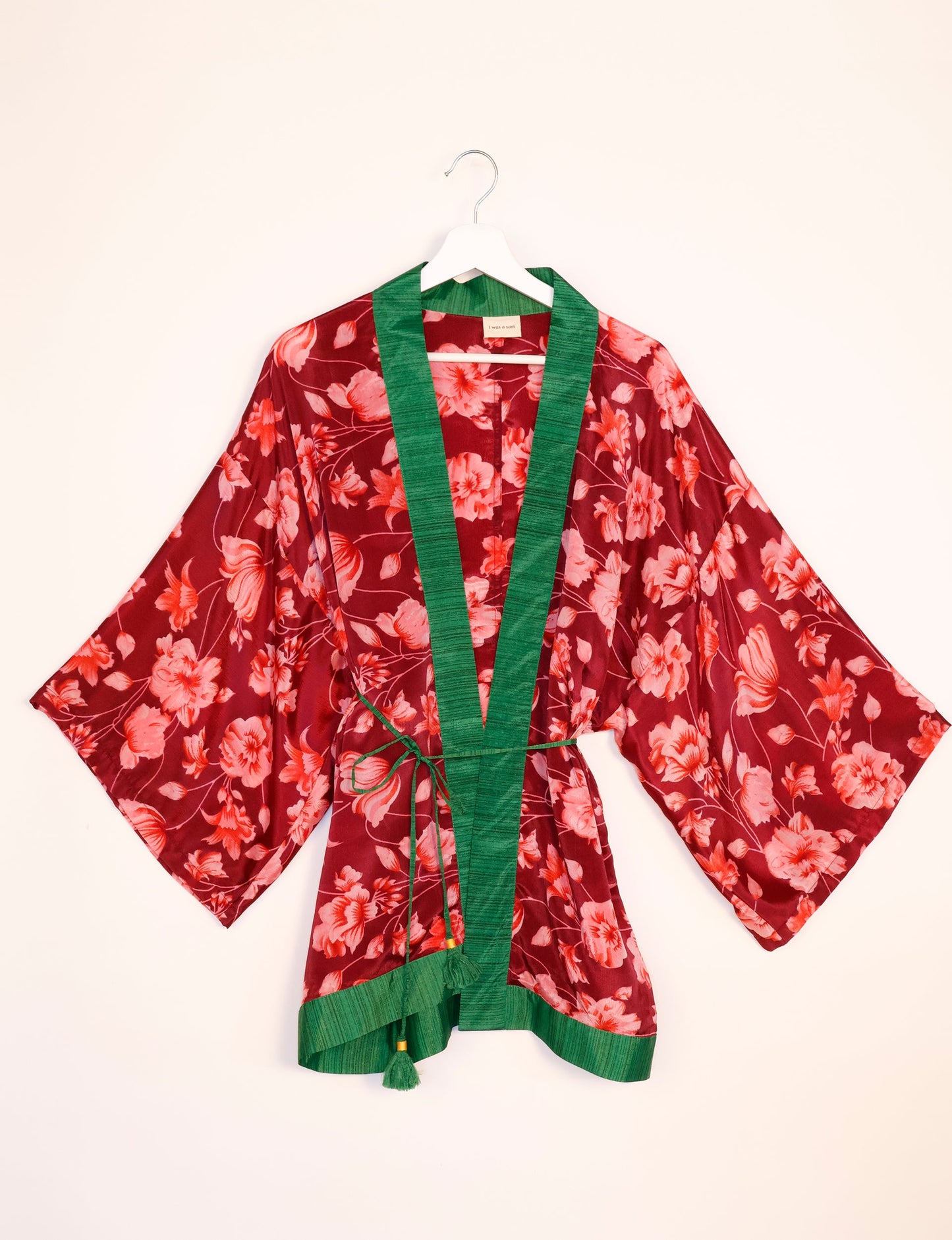 Chic and versatile KIMONO ROBE PRINT with a belt and loose straight-line sleeves. Throw it over swimwear, a t-shirt and shorts, leggings, or jeans for an instant style upgrade. Embrace fashionable versatility with this statement piece.