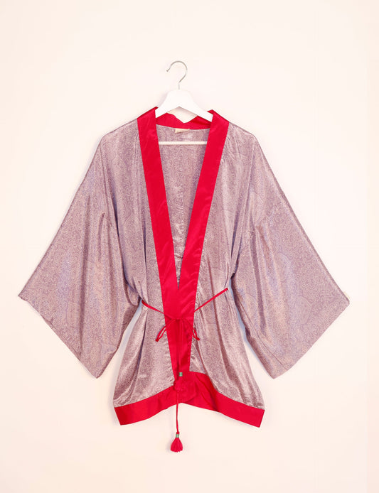 Chic and versatile KIMONO ROBE PRINT with a belt and loose straight-line sleeves. Throw it over swimwear, a t-shirt and shorts, leggings, or jeans for an instant style upgrade. Embrace fashionable versatility with this statement piece.