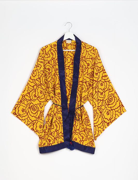 Chic and versatile KIMONO ROBE PRINT with a belt and loose straight-line sleeves. Throw it over swimwear, a t-shirt and shorts, leggings, or jeans for an instant style upgrade. Embrace fashionable versatility with this statement piece.