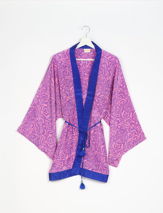 Chic and versatile KIMONO ROBE PRINT with a belt and loose straight-line sleeves. Throw it over swimwear, a t-shirt and shorts, leggings, or jeans for an instant style upgrade. Embrace fashionable versatility with this statement piece.