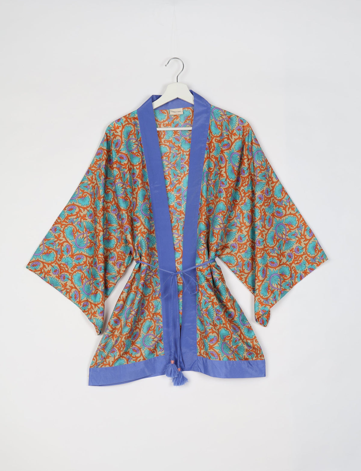 Chic and versatile KIMONO ROBE PRINT with a belt and loose straight-line sleeves. Throw it over swimwear, a t-shirt and shorts, leggings, or jeans for an instant style upgrade. Embrace fashionable versatility with this statement piece.