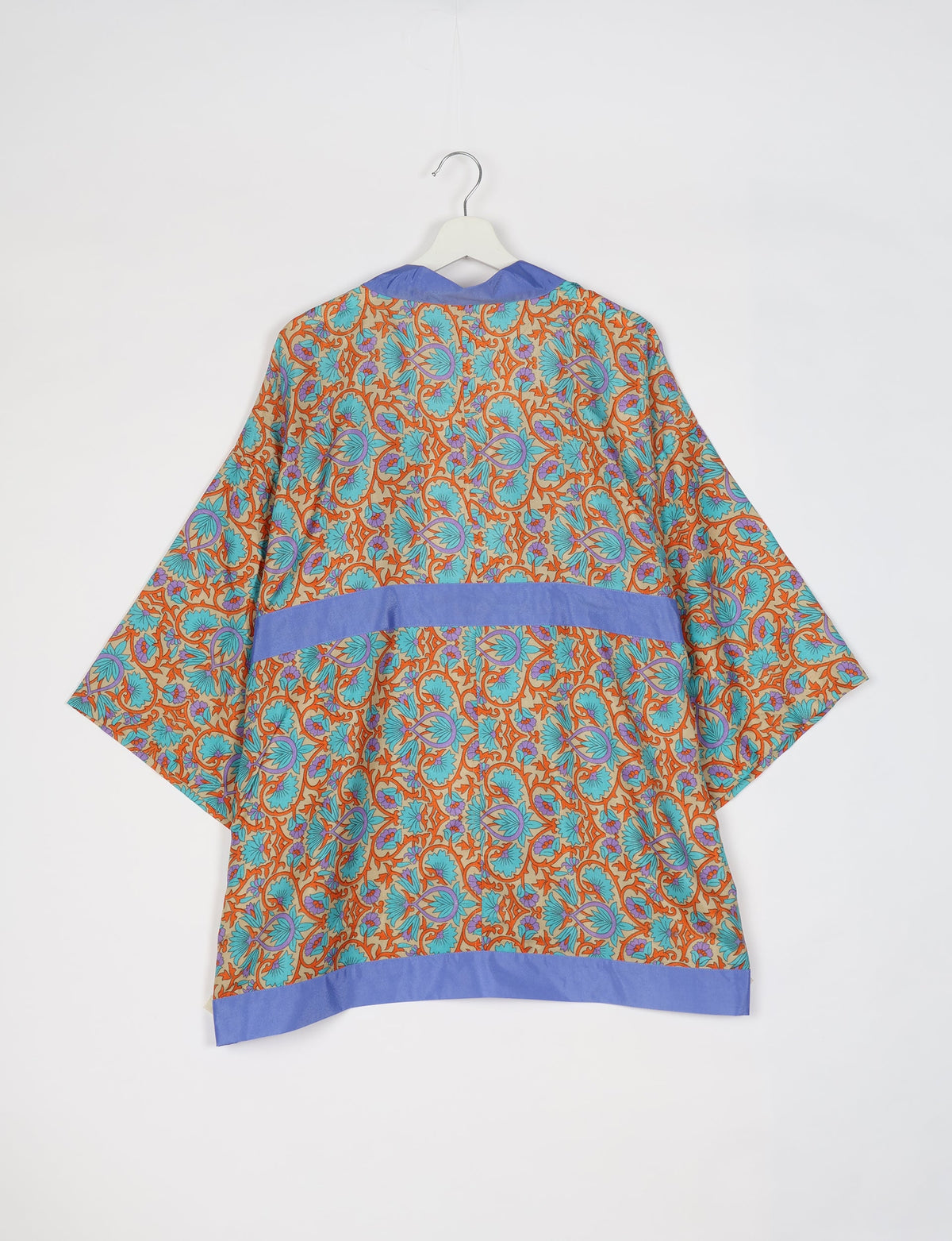Chic and versatile KIMONO ROBE PRINT with a belt and loose straight-line sleeves. Throw it over swimwear, a t-shirt and shorts, leggings, or jeans for an instant style upgrade. Embrace fashionable versatility with this statement piece.