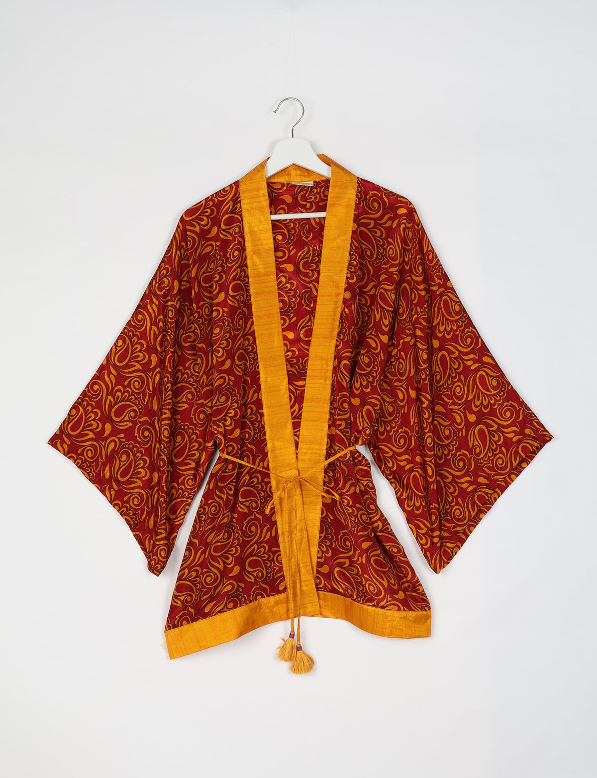 Chic and versatile KIMONO ROBE PRINT with a belt and loose straight-line sleeves. Throw it over swimwear, a t-shirt and shorts, leggings, or jeans for an instant style upgrade. Embrace fashionable versatility with this statement piece.