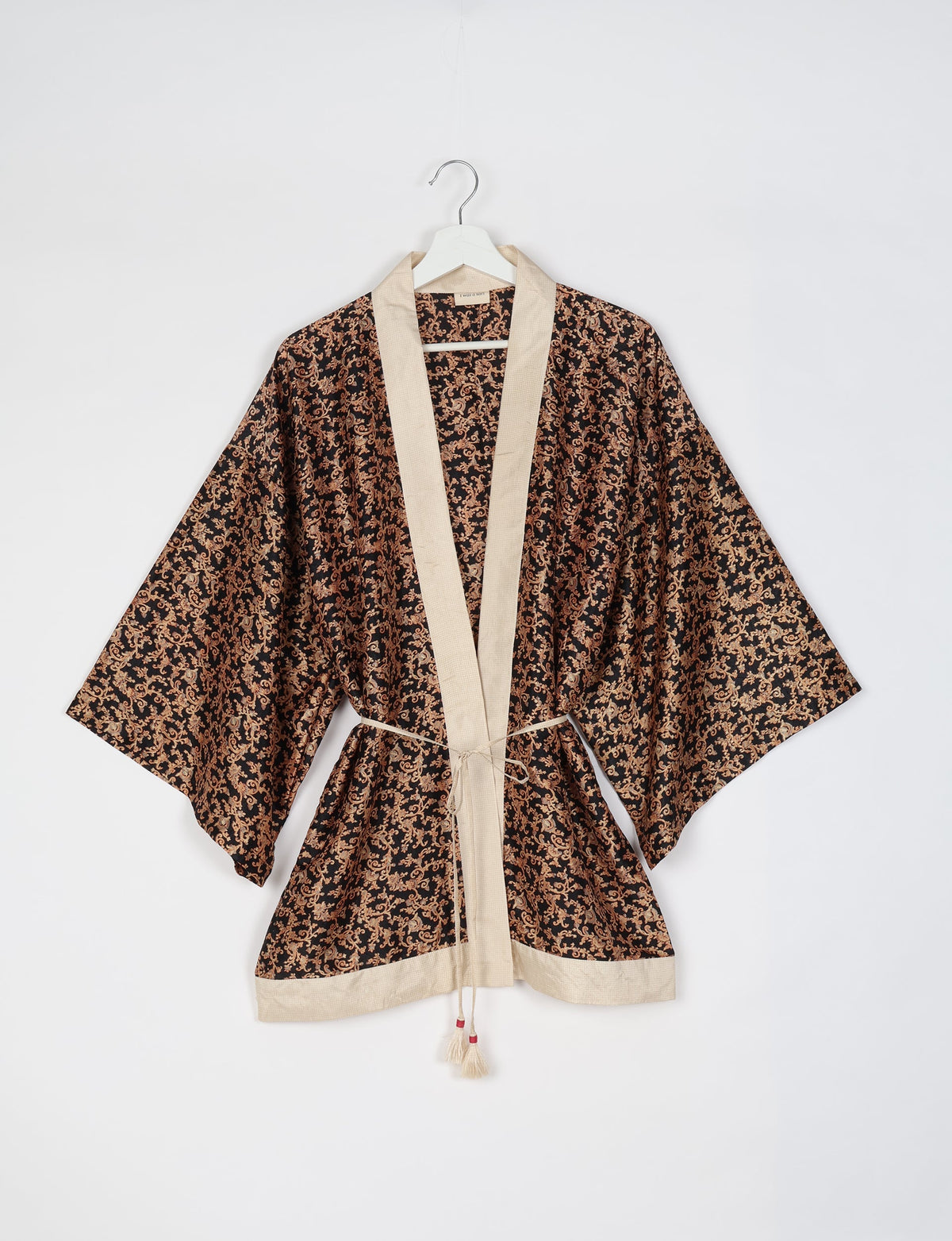 Chic and versatile KIMONO ROBE PRINT with a belt and loose straight-line sleeves. Throw it over swimwear, a t-shirt and shorts, leggings, or jeans for an instant style upgrade. Embrace fashionable versatility with this statement piece.