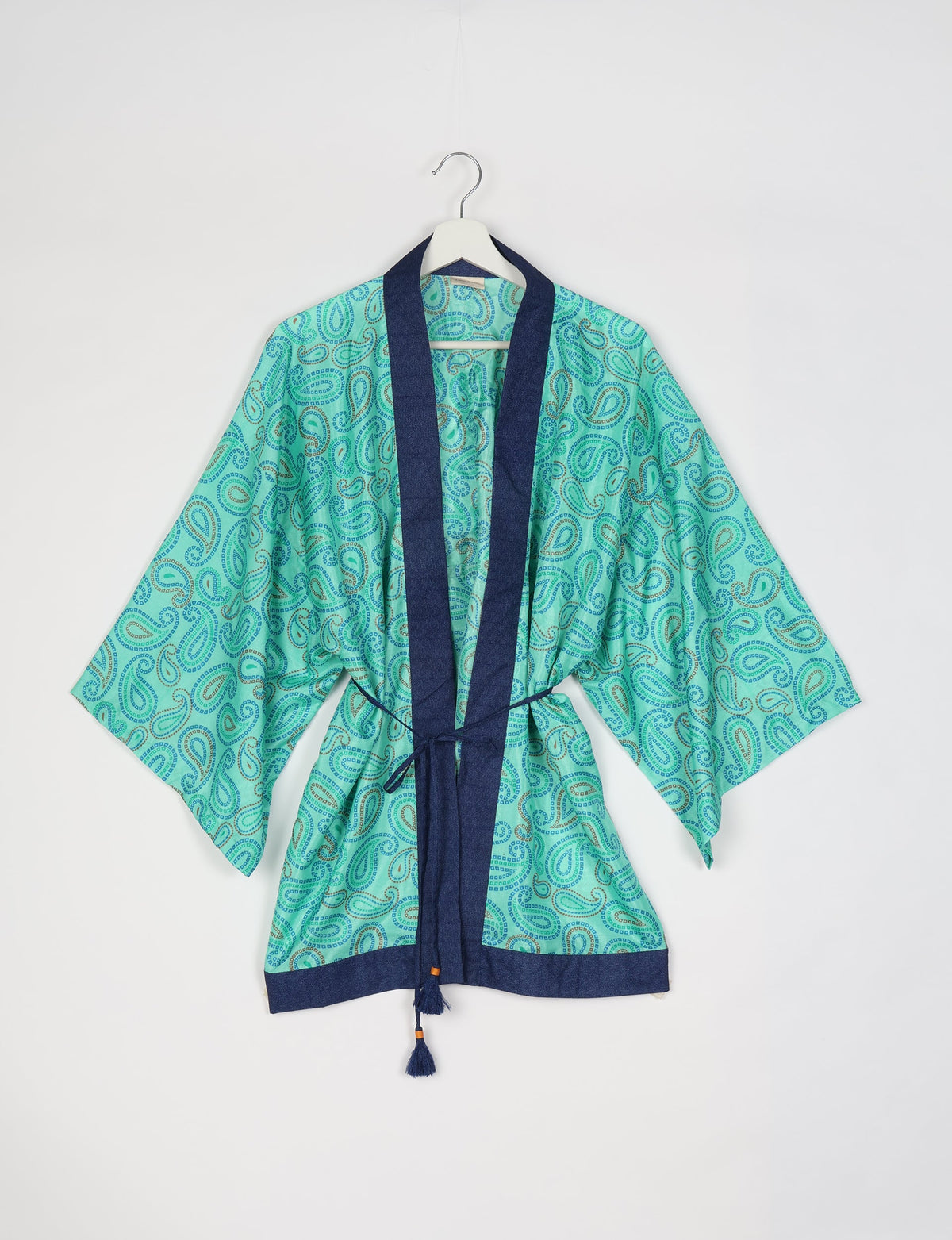 Chic and versatile KIMONO ROBE PRINT with a belt and loose straight-line sleeves. Throw it over swimwear, a t-shirt and shorts, leggings, or jeans for an instant style upgrade. Embrace fashionable versatility with this statement piece.