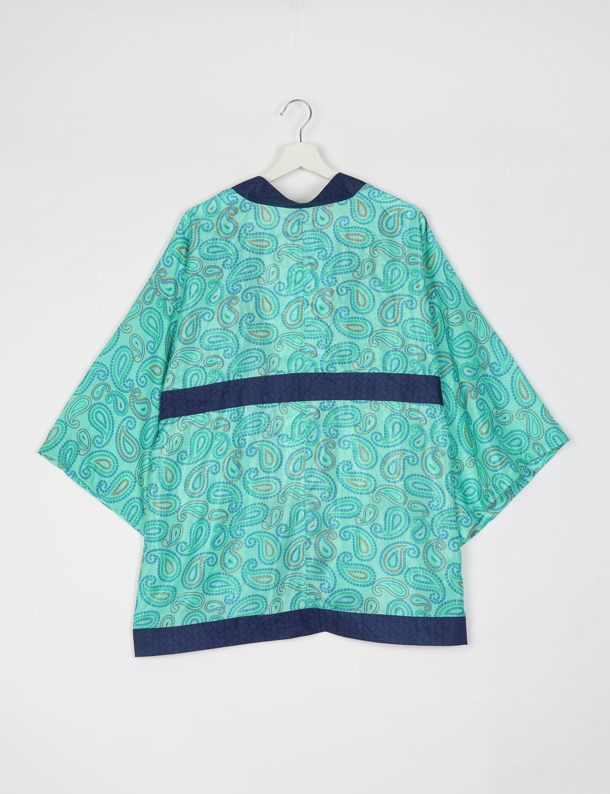 Chic and versatile KIMONO ROBE PRINT with a belt and loose straight-line sleeves. Throw it over swimwear, a t-shirt and shorts, leggings, or jeans for an instant style upgrade. Embrace fashionable versatility with this statement piece.