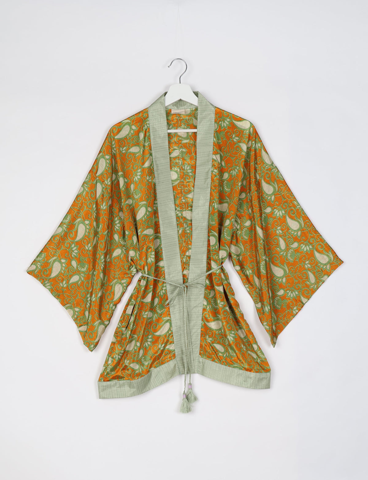 Chic and versatile KIMONO ROBE PRINT with a belt and loose straight-line sleeves. Throw it over swimwear, a t-shirt and shorts, leggings, or jeans for an instant style upgrade. Embrace fashionable versatility with this statement piece.