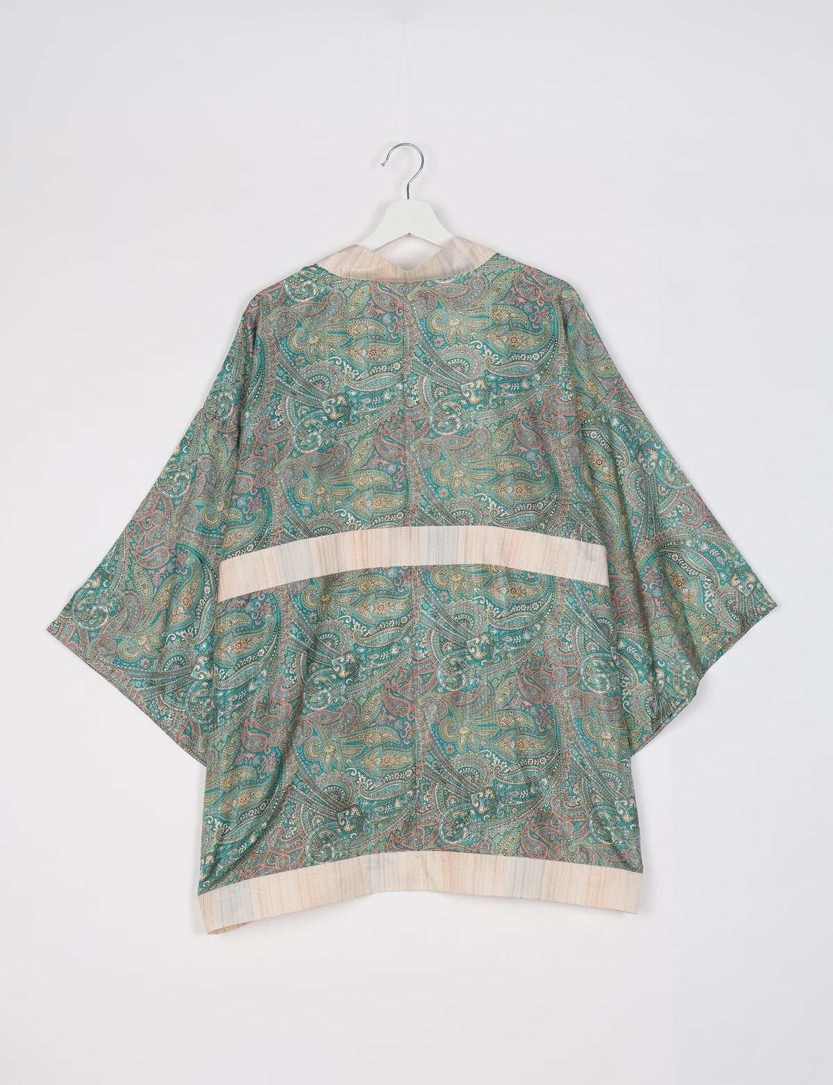 Chic and versatile KIMONO ROBE PRINT with a belt and loose straight-line sleeves. Throw it over swimwear, a t-shirt and shorts, leggings, or jeans for an instant style upgrade. Embrace fashionable versatility with this statement piece.
