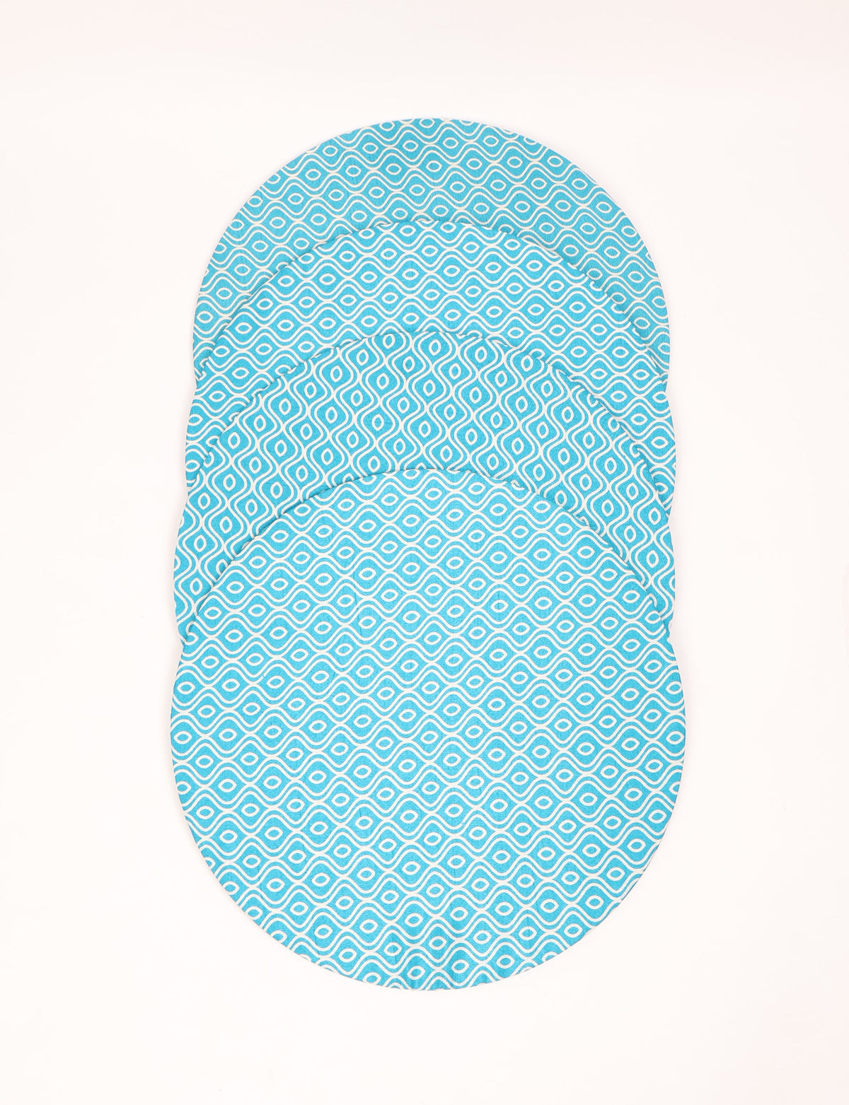 Set of four round blue placemats with white abstract geometric pattern, shown stacked flat on white background