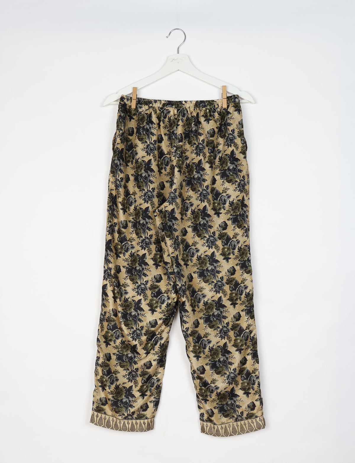 Elevate your wardrobe with our planet-friendly PULL-ON PANTS. Made from upcycled sari fabric, these eco-conscious pants offer a drawstring waist for a perfect fit. Tapered leg design ensures both style and comfort. Choose ethical, green fashion that supports artisans and sustainable living.