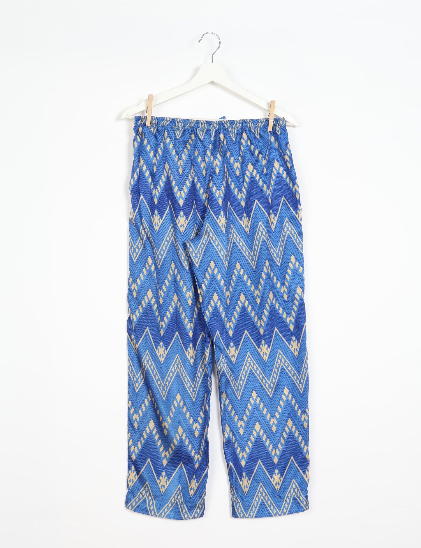 Elevate your wardrobe with our planet-friendly PULL-ON PANTS. Made from upcycled sari fabric, these eco-conscious pants offer a drawstring waist for a perfect fit. Tapered leg design ensures both style and comfort. Choose ethical, green fashion that supports artisans and sustainable living.