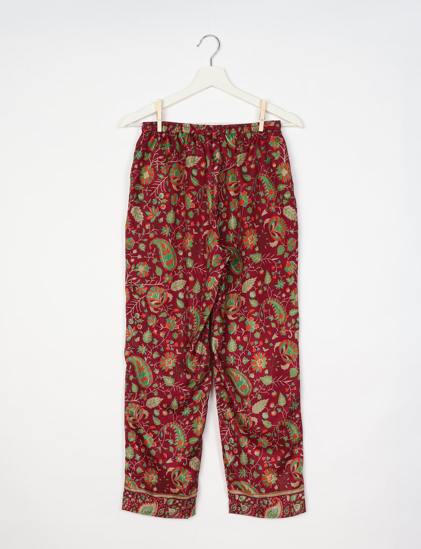 Elevate your wardrobe with our planet-friendly PULL-ON PANTS. Made from upcycled sari fabric, these eco-conscious pants offer a drawstring waist for a perfect fit. Tapered leg design ensures both style and comfort. Choose ethical, green fashion that supports artisans and sustainable living.