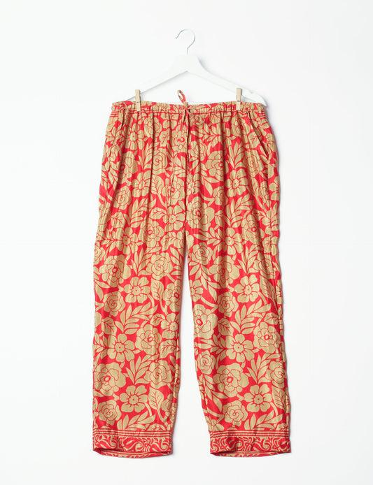 Elevate your wardrobe with our planet-friendly PULL-ON PANTS. Made from upcycled sari fabric, these eco-conscious pants offer a drawstring waist for a perfect fit. Tapered leg design ensures both style and comfort. Choose ethical, green fashion that supports artisans and sustainable living.