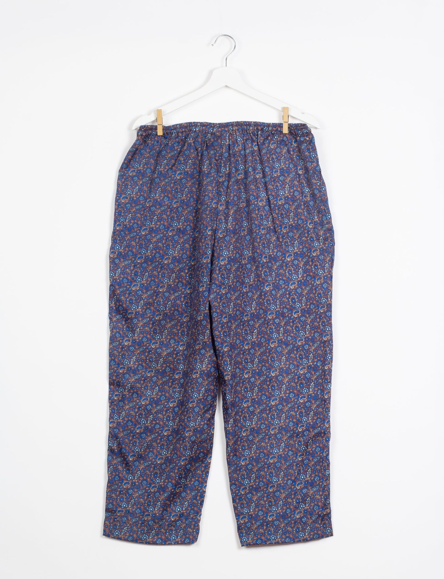 Elevate your wardrobe with our planet-friendly PULL-ON PANTS. Made from upcycled sari fabric, these eco-conscious pants offer a drawstring waist for a perfect fit. Tapered leg design ensures both style and comfort. Choose ethical, green fashion that supports artisans and sustainable living.