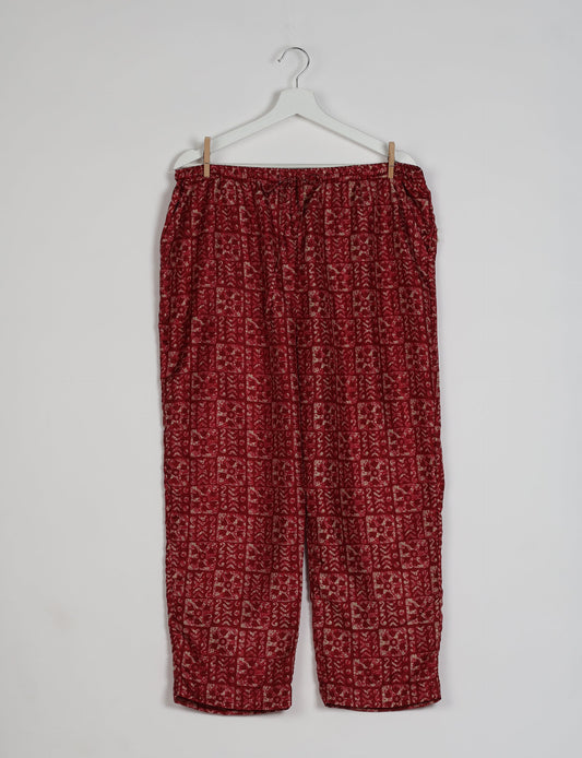 Elevate your wardrobe with our planet-friendly PULL-ON PANTS. Made from upcycled sari fabric, these eco-conscious pants offer a drawstring waist for a perfect fit. Tapered leg design ensures both style and comfort. Choose ethical, green fashion that supports artisans and sustainable living.