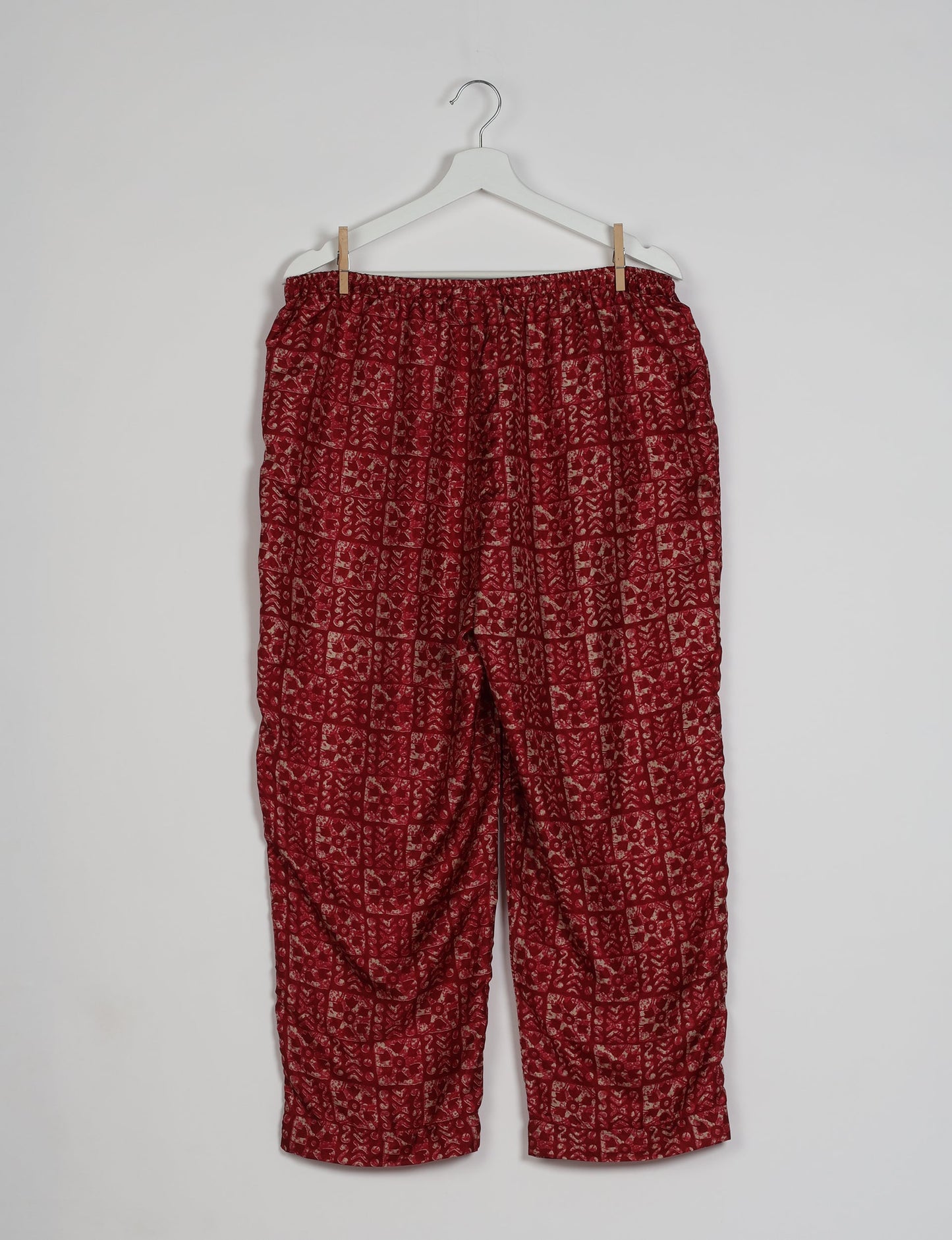 Elevate your wardrobe with our planet-friendly PULL-ON PANTS. Made from upcycled sari fabric, these eco-conscious pants offer a drawstring waist for a perfect fit. Tapered leg design ensures both style and comfort. Choose ethical, green fashion that supports artisans and sustainable living.