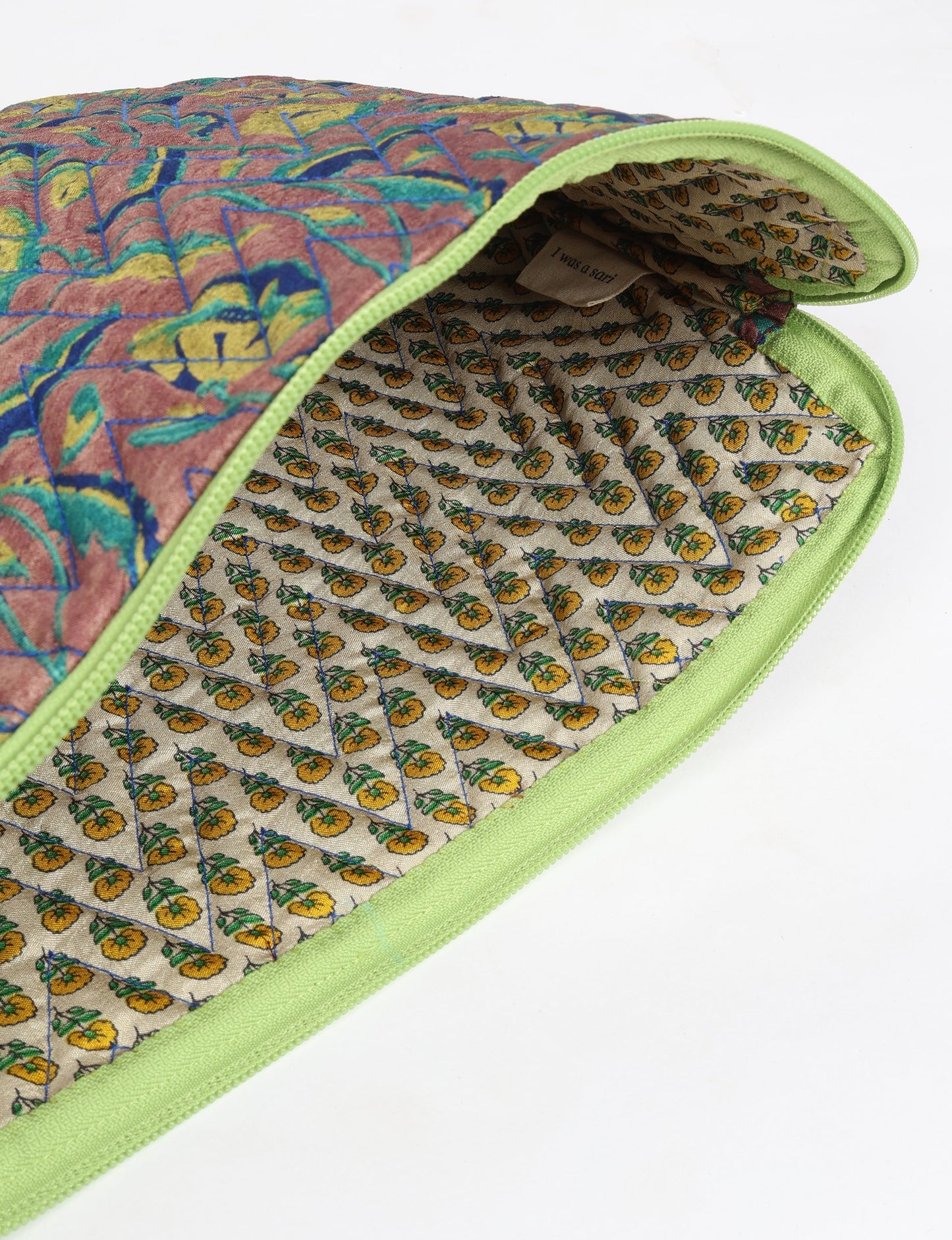 Eco-friendly meets tech-savvy in our QUILTED LAPTOP SLEEVE 13-14 inches. Stylishly quilted for durability, this sleeve offers protection and ethical fashion for your 13"-14" laptop. Secure your device with the zippered closure and carry it sustainably wherever you go.