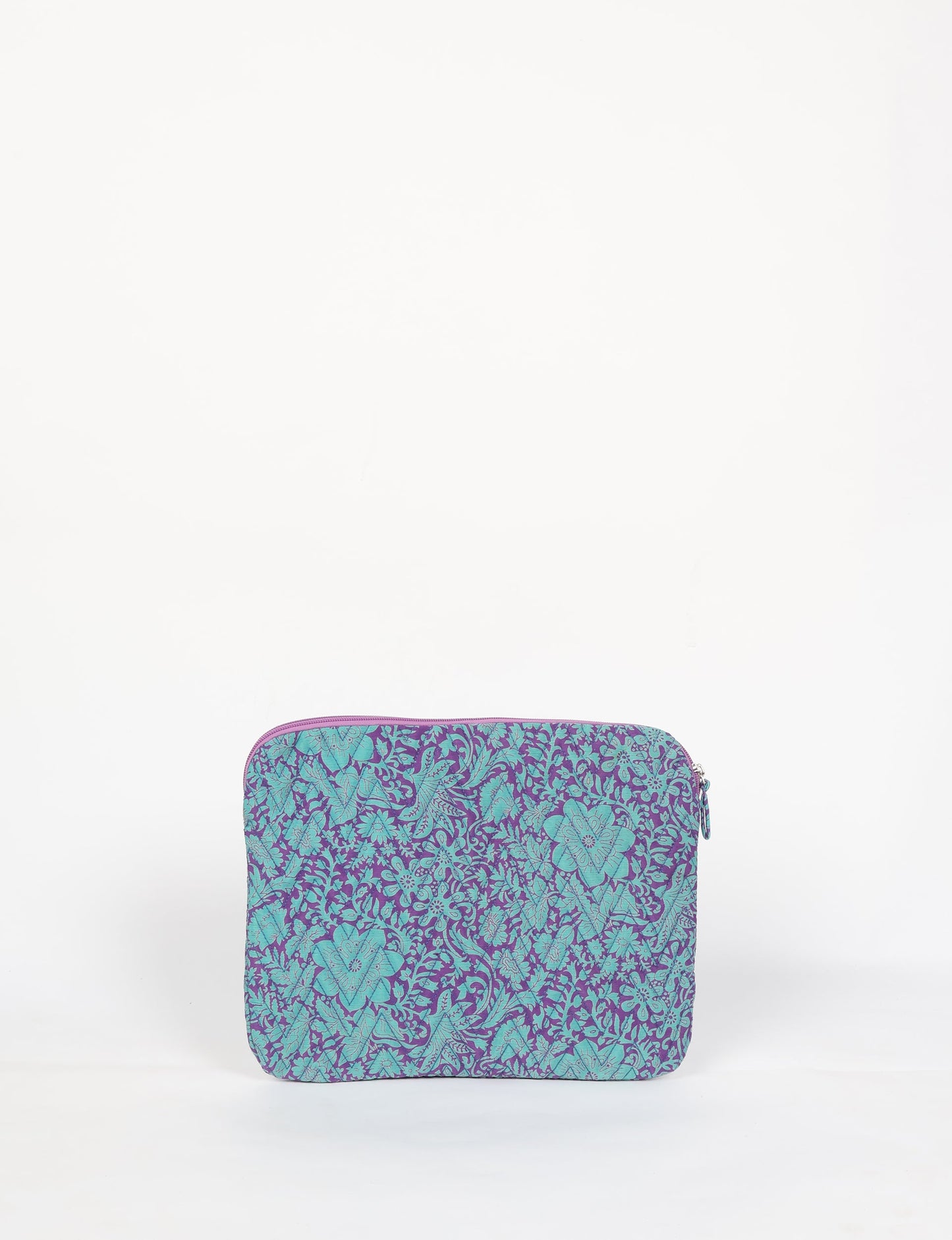 Eco-friendly meets tech-savvy in our QUILTED LAPTOP SLEEVE 13-14 inches. Stylishly quilted for durability, this sleeve offers protection and ethical fashion for your 13"-14" laptop. Secure your device with the zippered closure and carry it sustainably wherever you go.