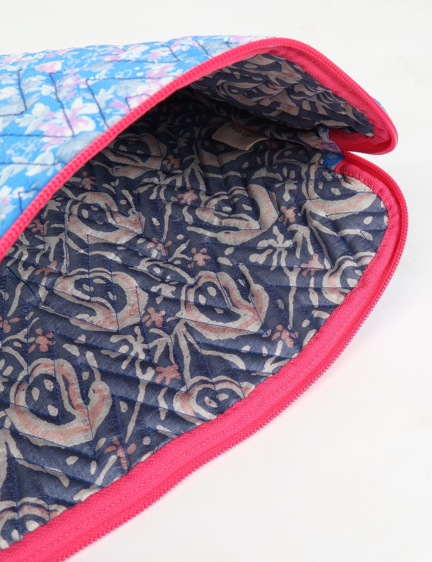 Eco-friendly meets tech-savvy in our QUILTED LAPTOP SLEEVE 13-14 inches. Stylishly quilted for durability, this sleeve offers protection and ethical fashion for your 13"-14" laptop. Secure your device with the zippered closure and carry it sustainably wherever you go.