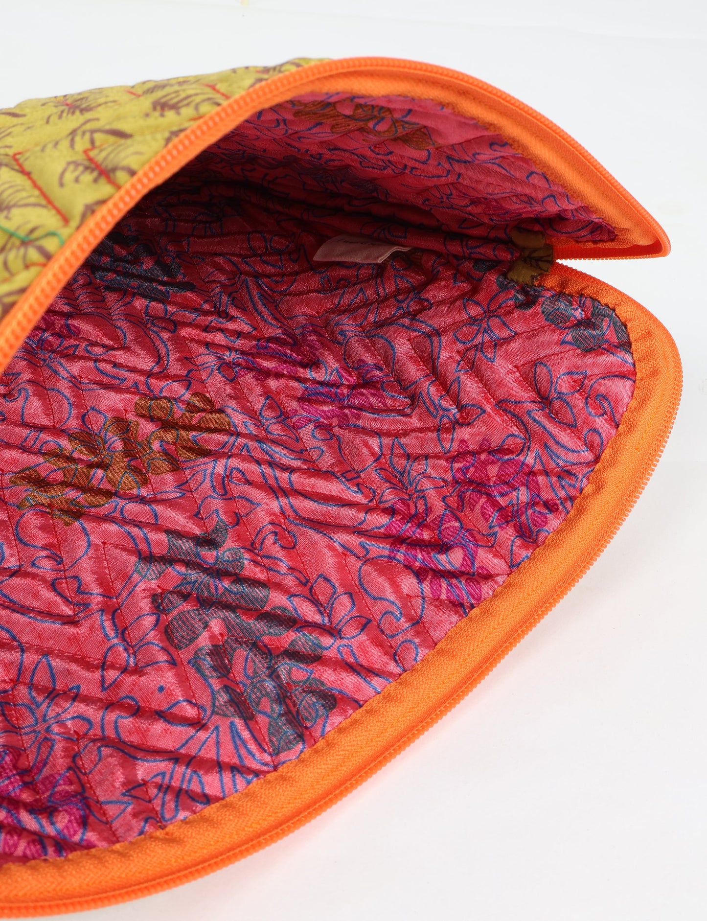 Eco-friendly meets tech-savvy in our QUILTED LAPTOP SLEEVE 13-14 inches. Stylishly quilted for durability, this sleeve offers protection and ethical fashion for your 13"-14" laptop. Secure your device with the zippered closure and carry it sustainably wherever you go.