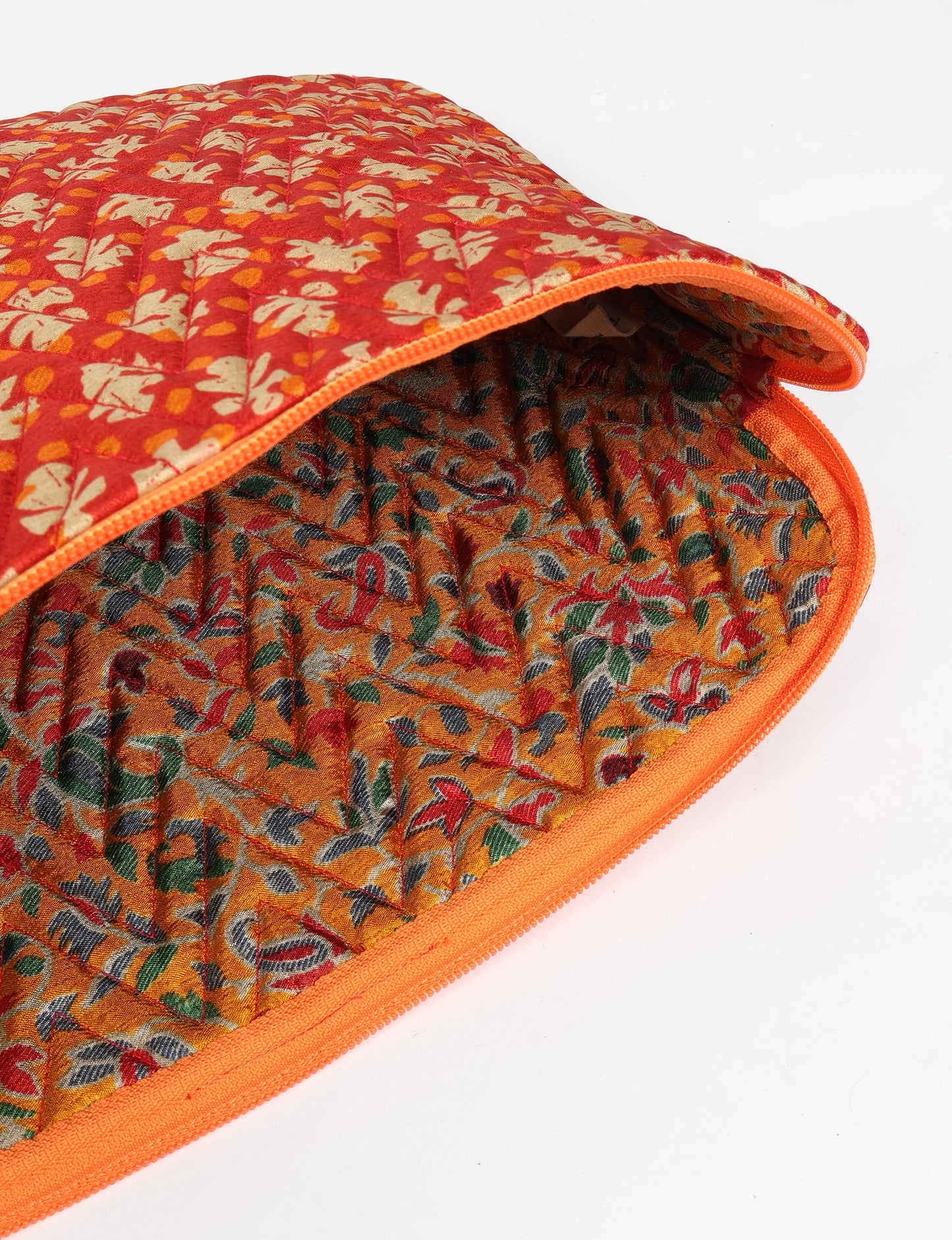 Eco-friendly meets tech-savvy in our QUILTED LAPTOP SLEEVE 13-14 inches. Stylishly quilted for durability, this sleeve offers protection and ethical fashion for your 13"-14" laptop. Secure your device with the zippered closure and carry it sustainably wherever you go.