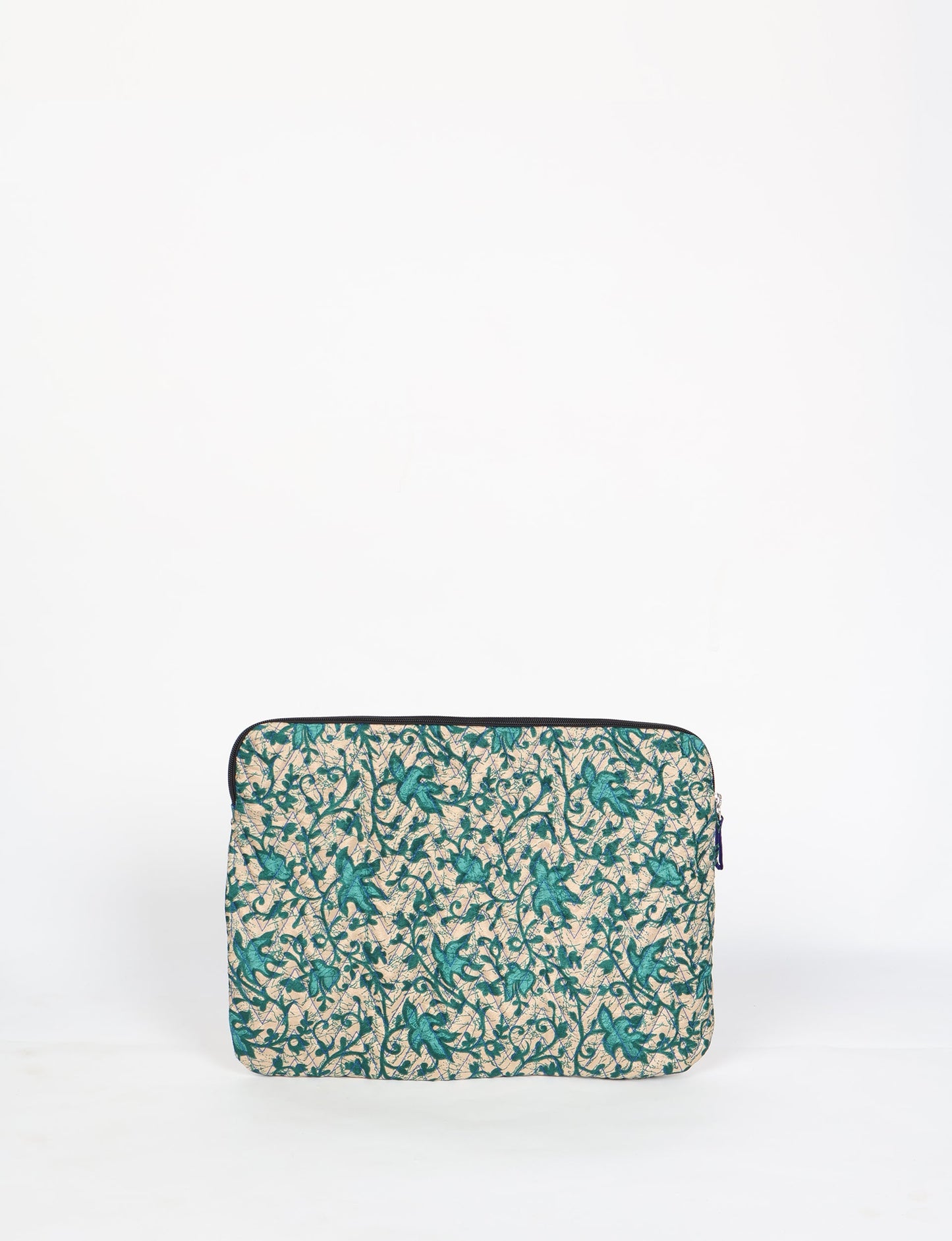 Eco-friendly meets tech-savvy in our QUILTED LAPTOP SLEEVE 13-14 inches. Stylishly quilted for durability, this sleeve offers protection and ethical fashion for your 13"-14" laptop. Secure your device with the zippered closure and carry it sustainably wherever you go.