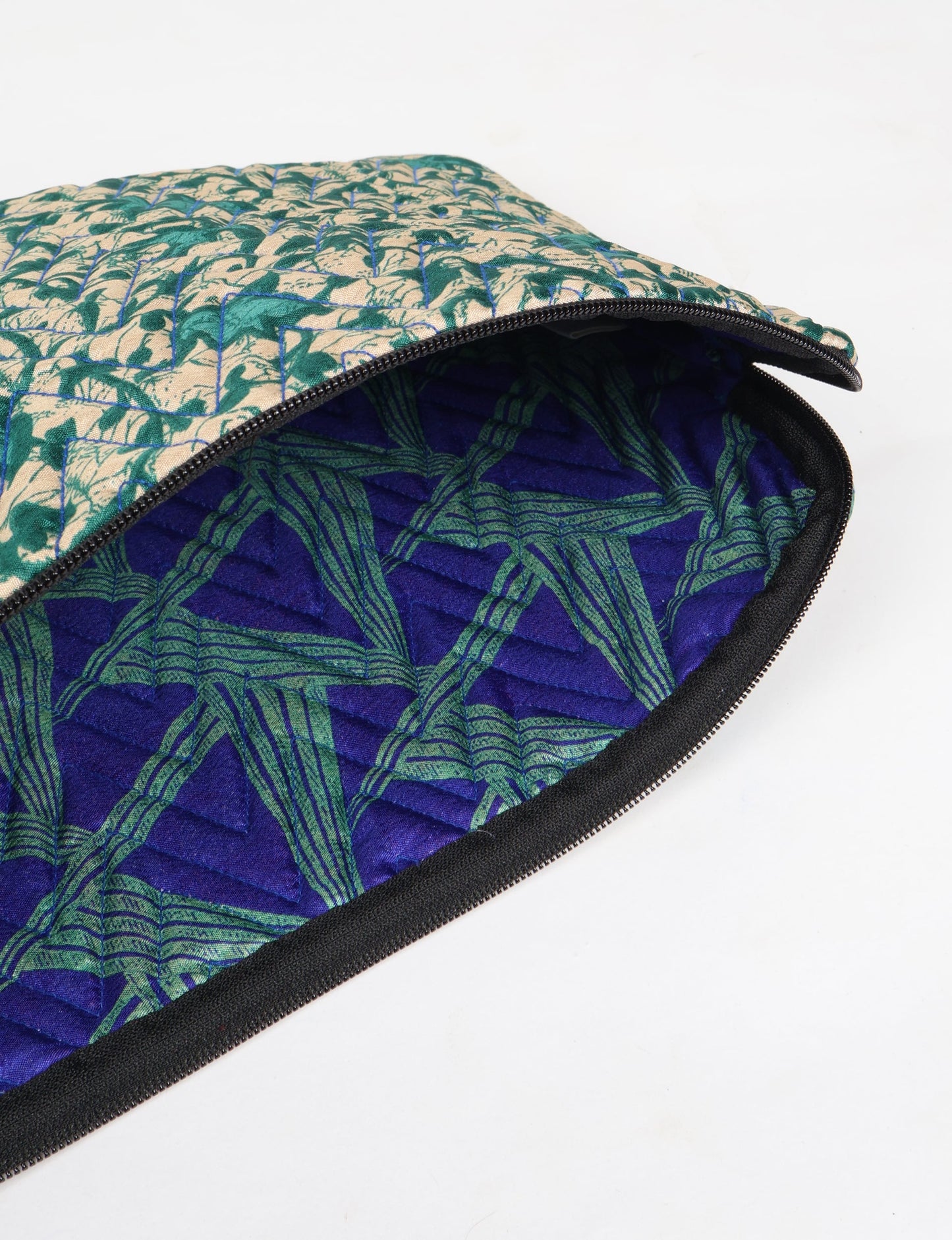 Eco-friendly meets tech-savvy in our QUILTED LAPTOP SLEEVE 13-14 inches. Stylishly quilted for durability, this sleeve offers protection and ethical fashion for your 13"-14" laptop. Secure your device with the zippered closure and carry it sustainably wherever you go.