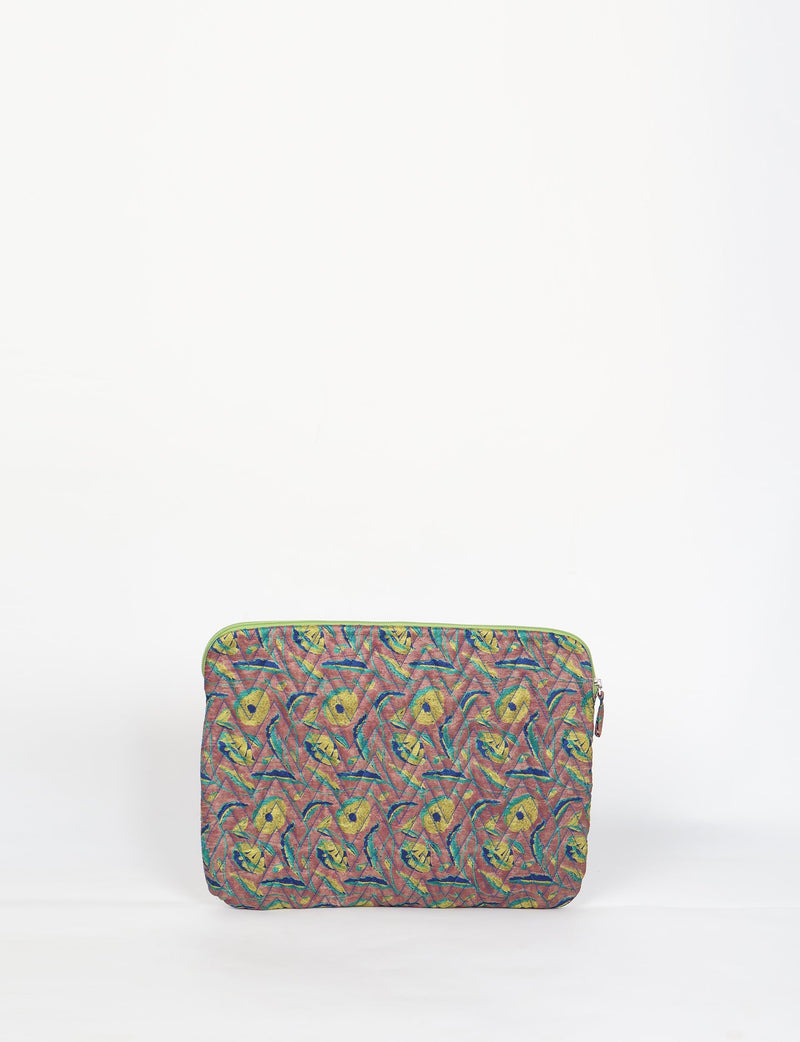 Quilted laptop sleeve with brown floral pattern, green zipper, and wrist strap, shown front view on white background