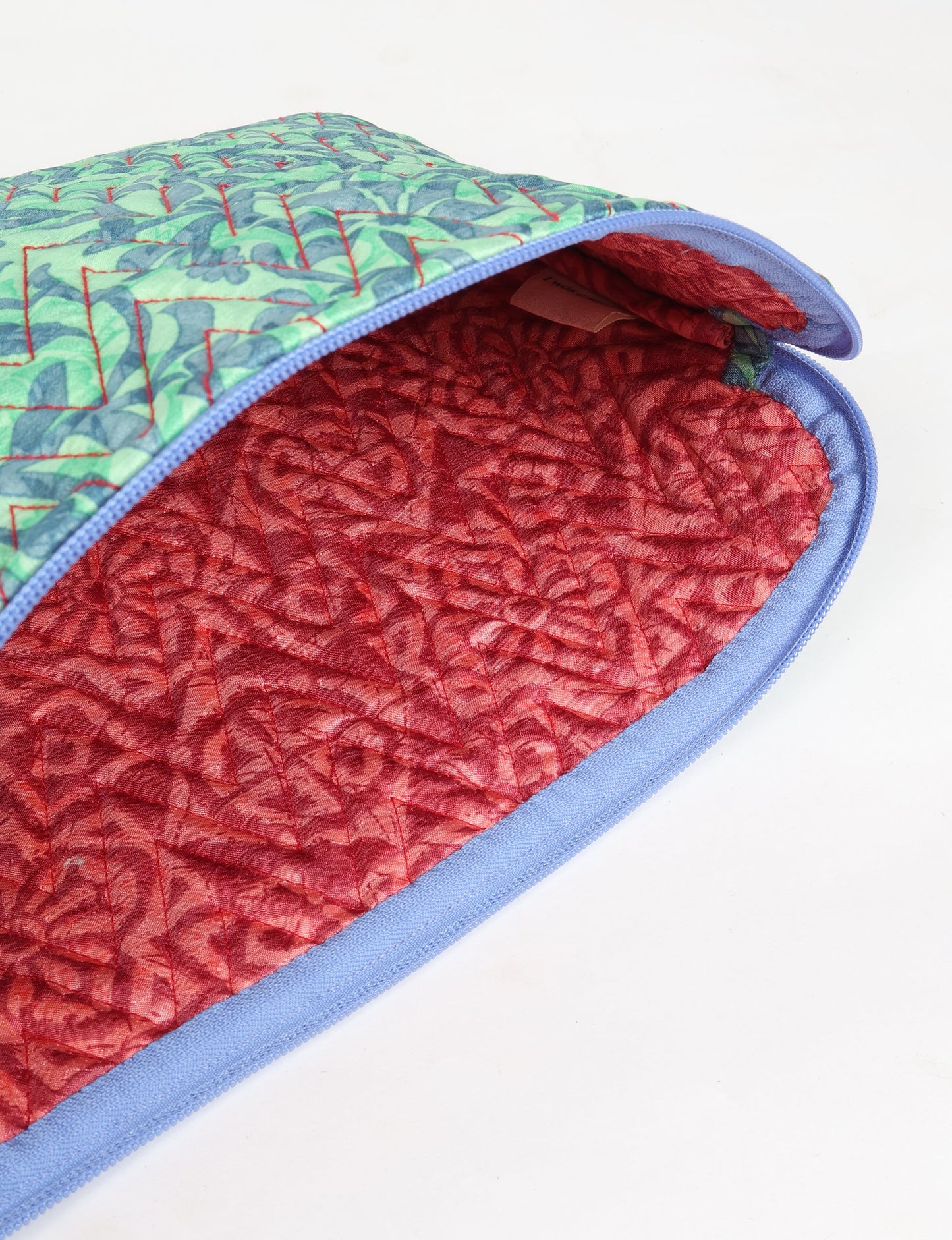 Elevate your tech style with our QUILTED LAPTOP SLEEVE 15-16 inches. Crafted with eco-friendly materials, the quilted design provides cushioning and durable protection for your 15"-16" laptop. Lightweight and stylish, with a secure zipper closure – your ethical choice for sustainable tech storage.