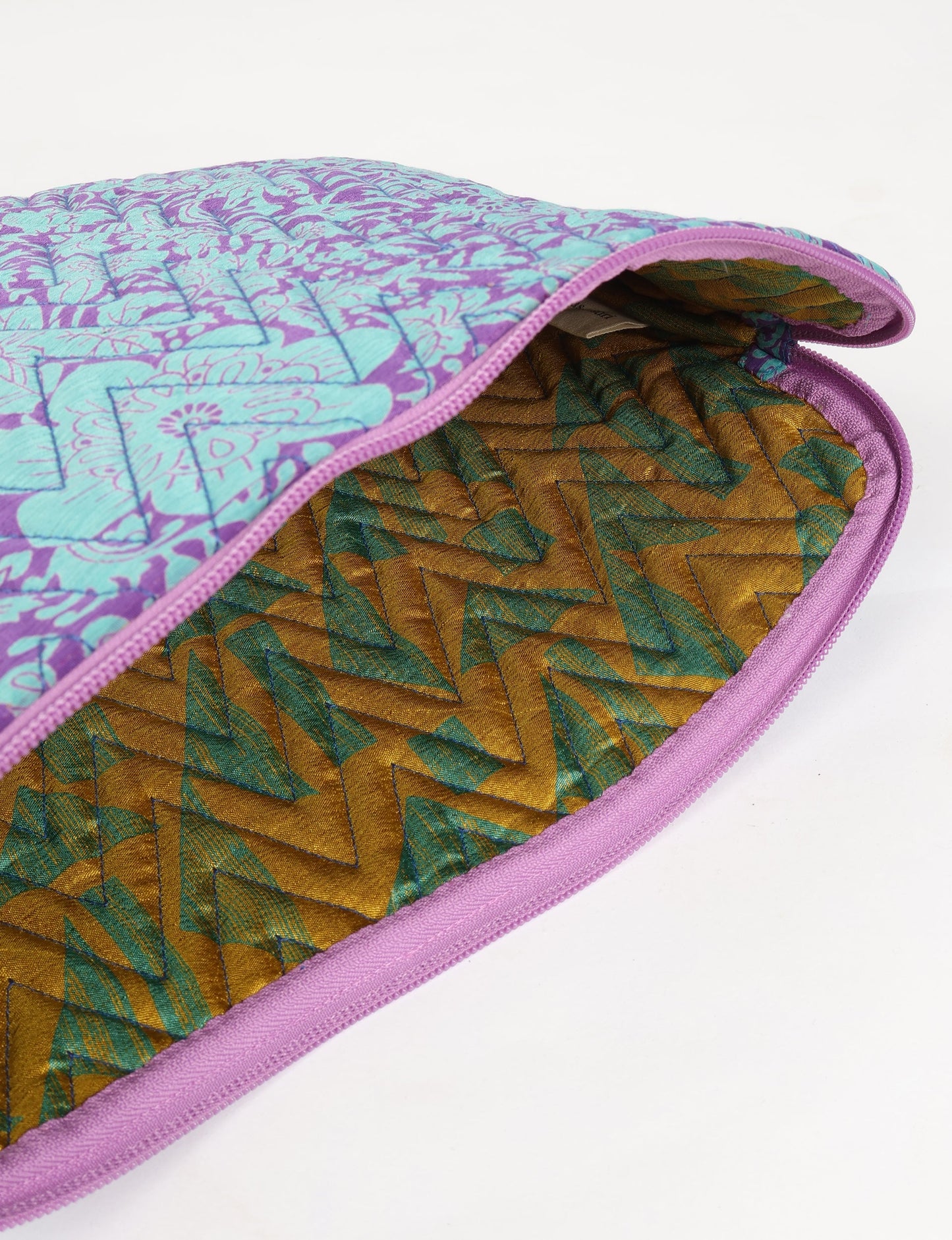 Elevate your tech style with our QUILTED LAPTOP SLEEVE 15-16 inches. Crafted with eco-friendly materials, the quilted design provides cushioning and durable protection for your 15"-16" laptop. Lightweight and stylish, with a secure zipper closure – your ethical choice for sustainable tech storage.