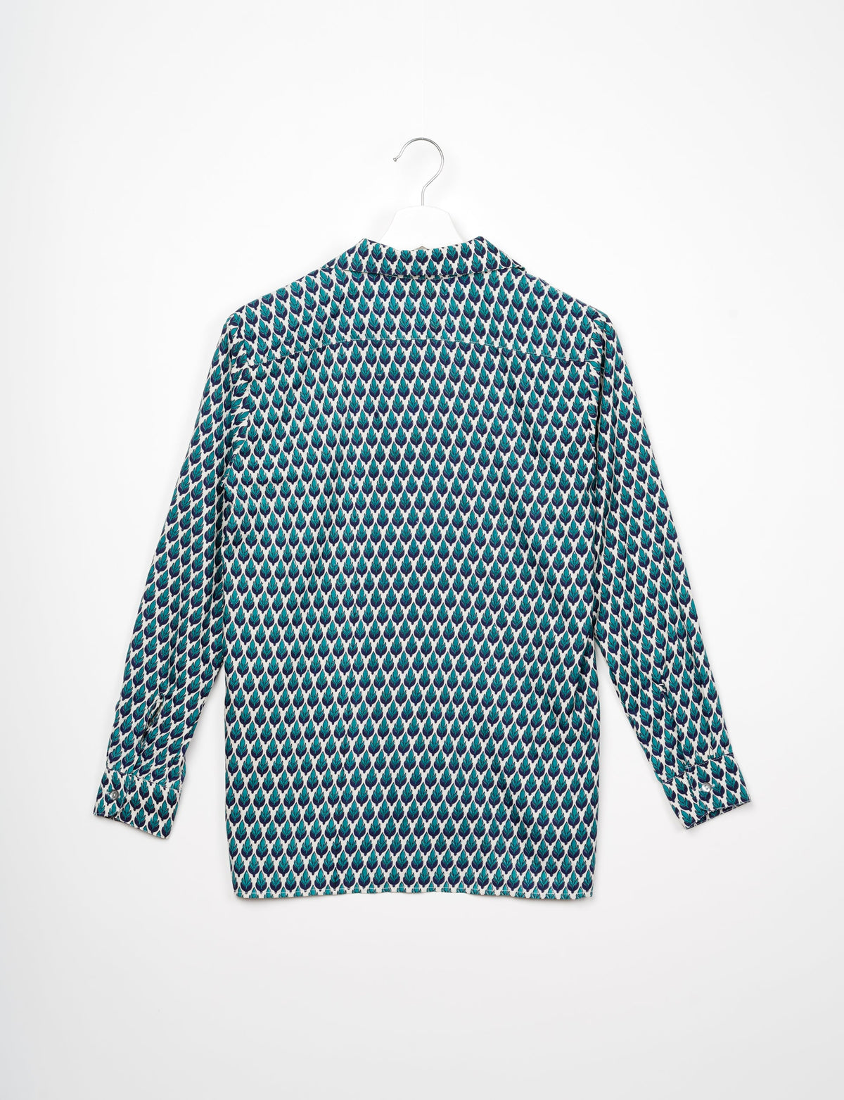 Long-sleeve resort shirt with green and blue leaf micro design pattern, shown from back on white hanger against white background