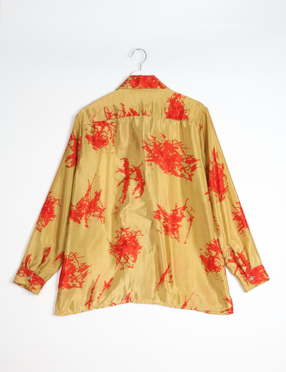 A person wearing a Resort Shirt, a sustainable fashion choice made from recycled materials.